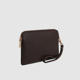Brown handbag with a strap on a light gray background