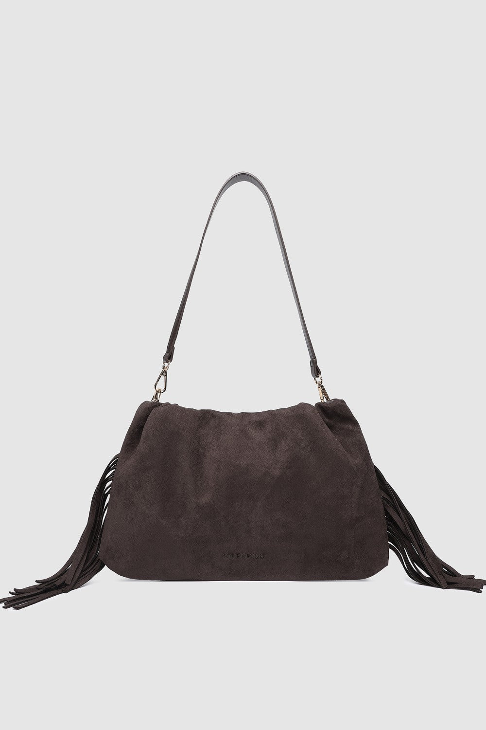 Brown suede handbag with fringe details on a light gray background