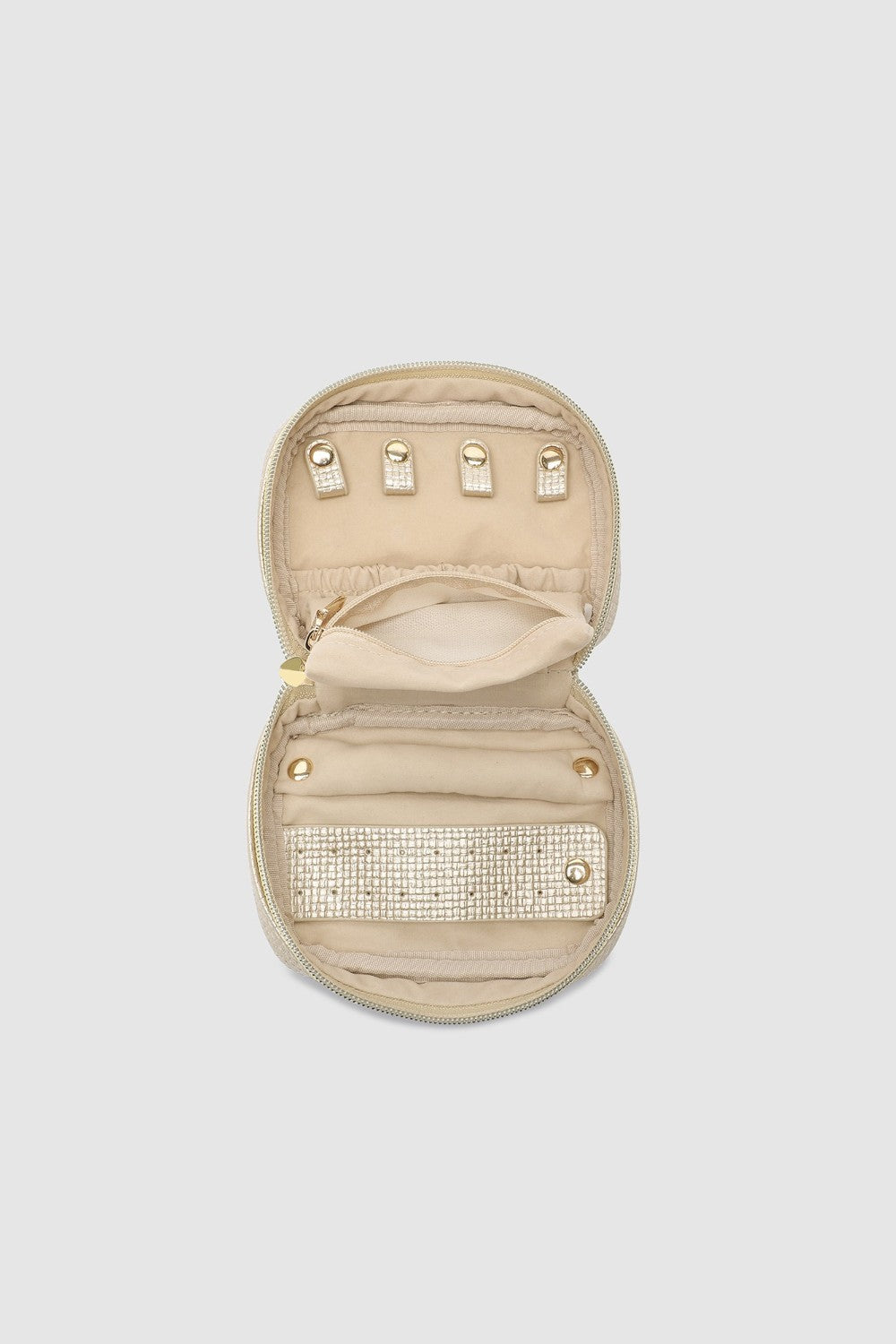 Open champagne coloured jewellery case on white background