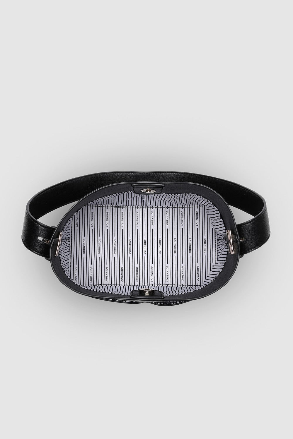 Black bag with patterned lining on a light gray background