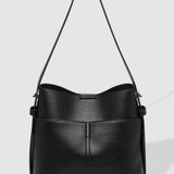 Black pleather handbag on a light gray background