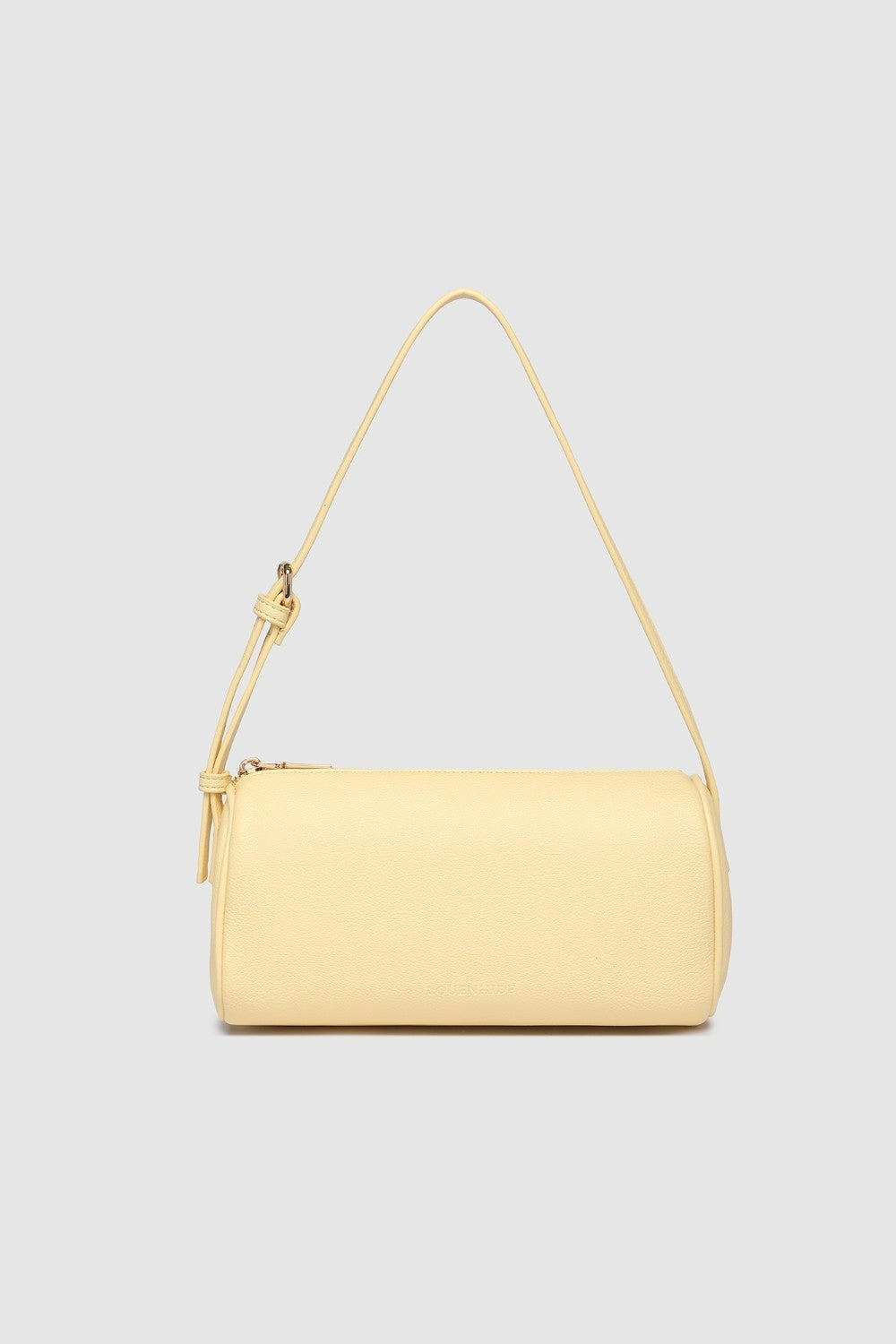 Yellow handbag with a strap on a light gray background