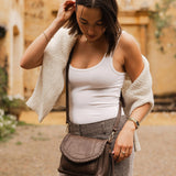 The Louenhide Shania Crossbody Bag is the epitome of elevated style that complements any ensemble. This casual women’s crossbody bag features a subtle woven vegan leather trim that adds a touch of effortless sophistication to your capsule wardrobe. 