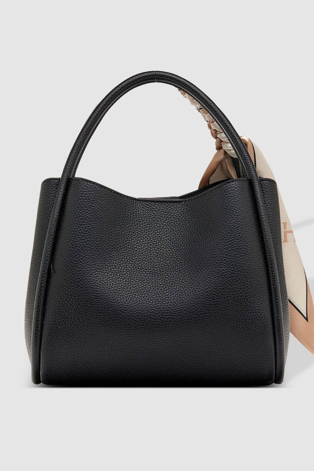 Black handbag on a light gray background