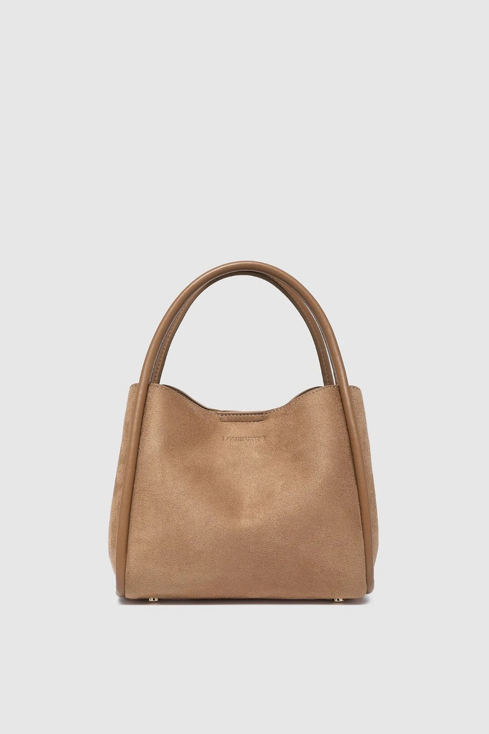 A tan leather handbag with a slouchy, slouchy silhouette and dual top handles, photographed against a solid light gray background.