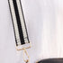 Black striped strap on a white background
