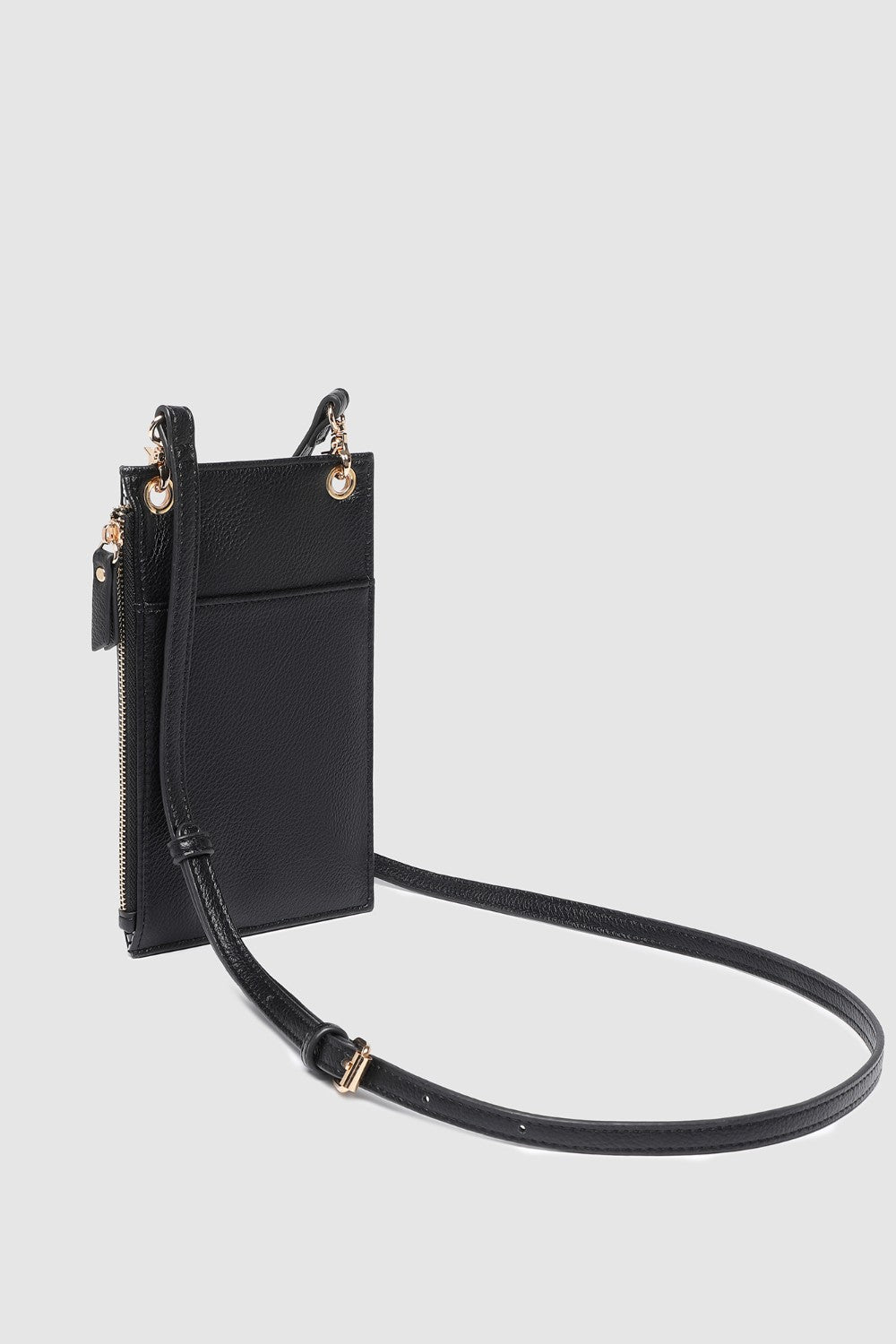 Black crossbody bag with a strap on a light gray background
