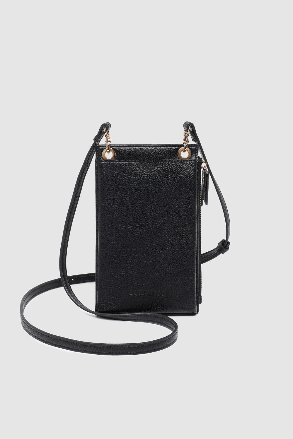 Black crossbody bag on a light gray background