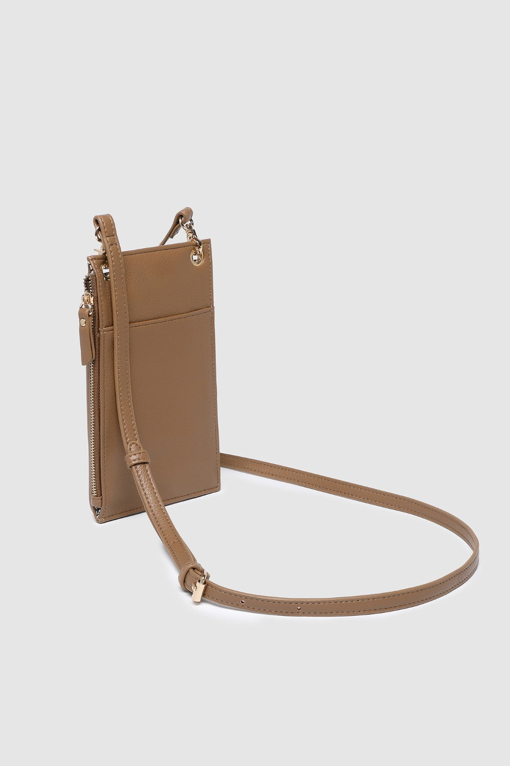 Brown leather crossbody bag on a light gray background