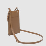 Brown leather crossbody bag on a light gray background