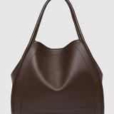 A dark brown leather hobo handbag with a slouchy, curved silhouette and double shoulder straps, shown against a light gray background.