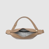Beige bag with a zipper on a light gray background