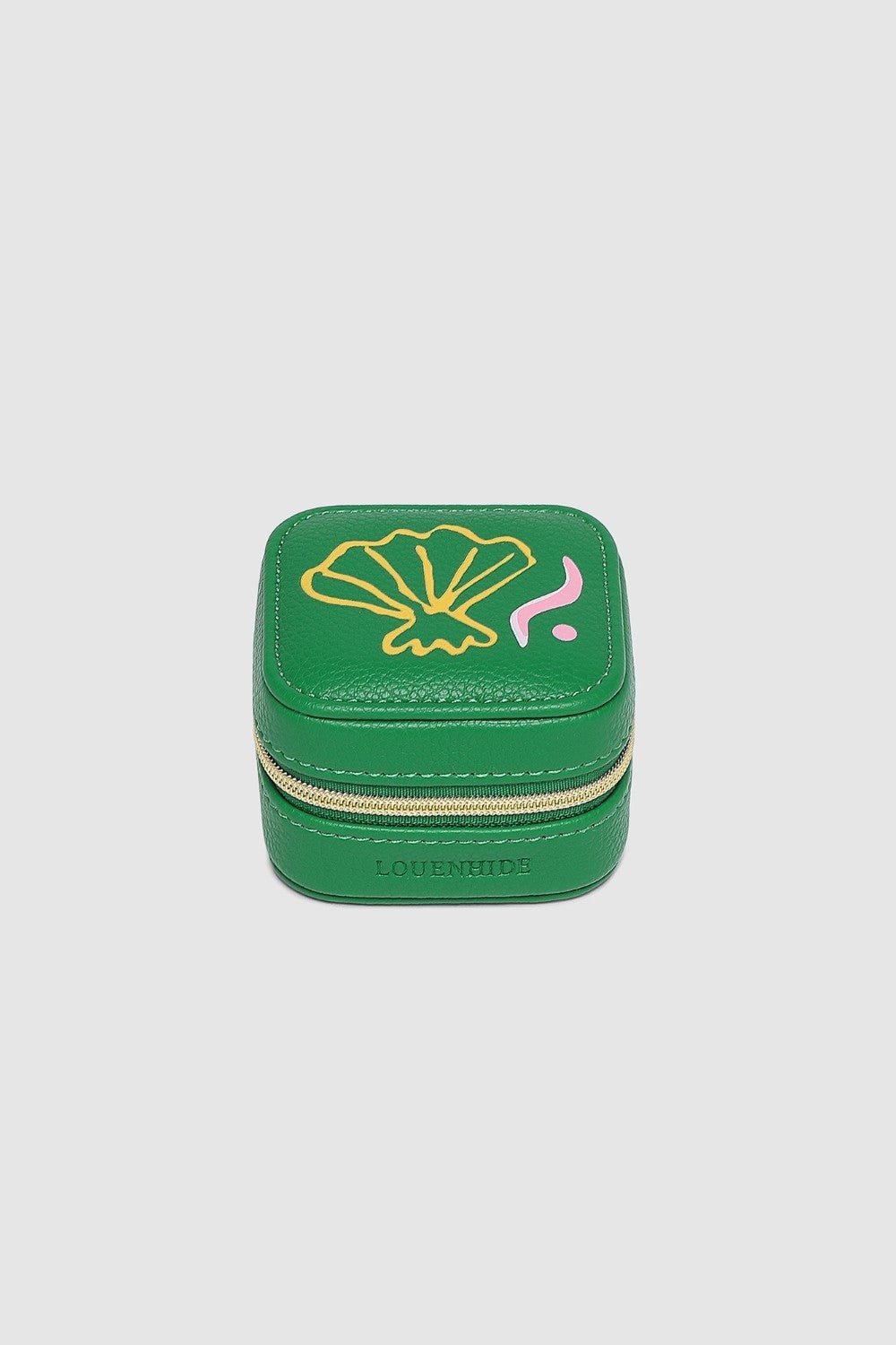 Green jewelry box with a shell design on a light gray background