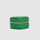 Green jewelry box on a light gray background