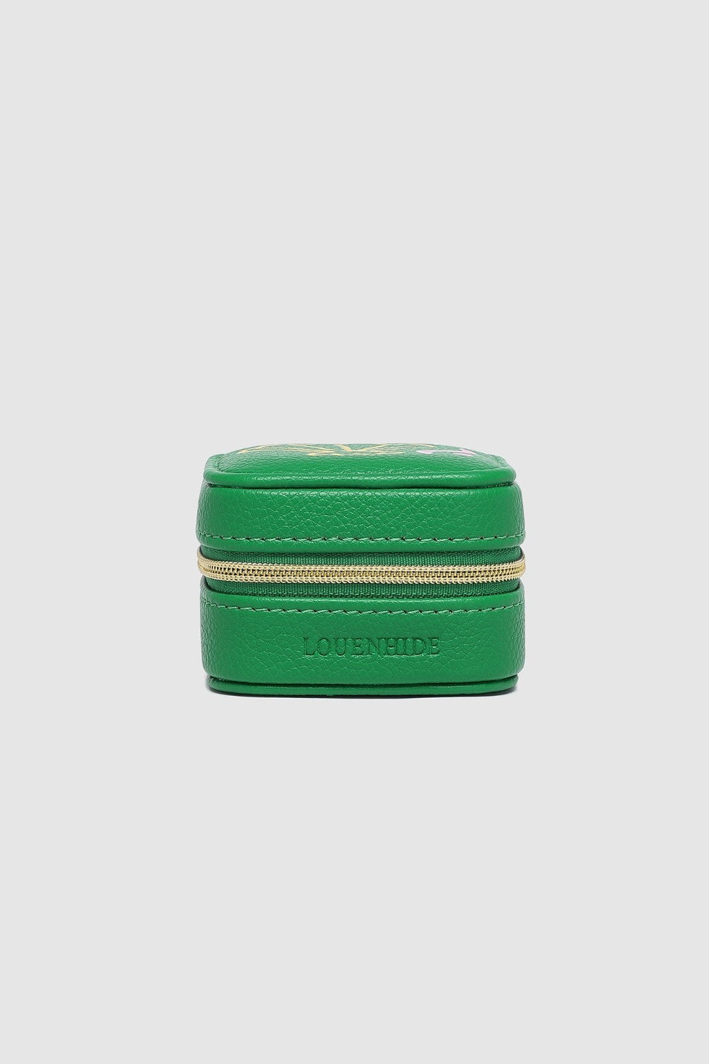 Green jewelry box on a light gray background