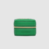 Green jewelry box on a light gray background