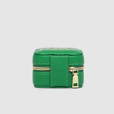 Green jewelry box on a light gray background