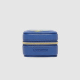 Blue jewelry box with gold zipper on a light gray background