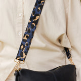 The Louenhide Tyler Bag Strap is a fun statement strap, created in a vibrant metallic animal print. Constructed with soft sateen webbing and finished with vegan leather and light gold hardware, this adjustable strap is a gorgeous way to switch up your look.