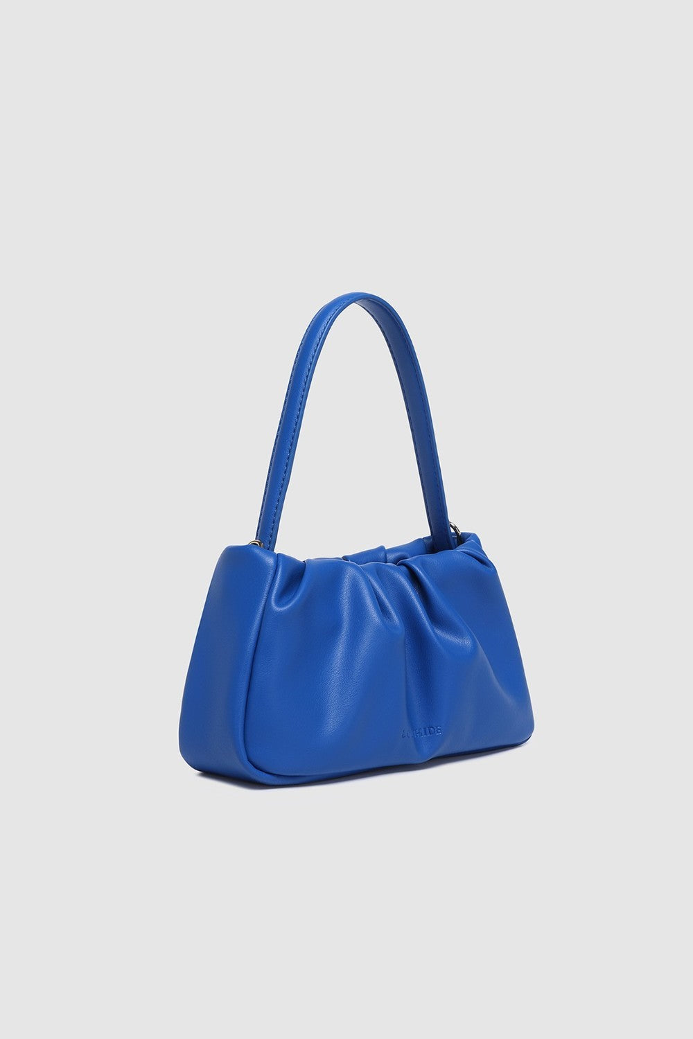 Blue handbag on a light gray background