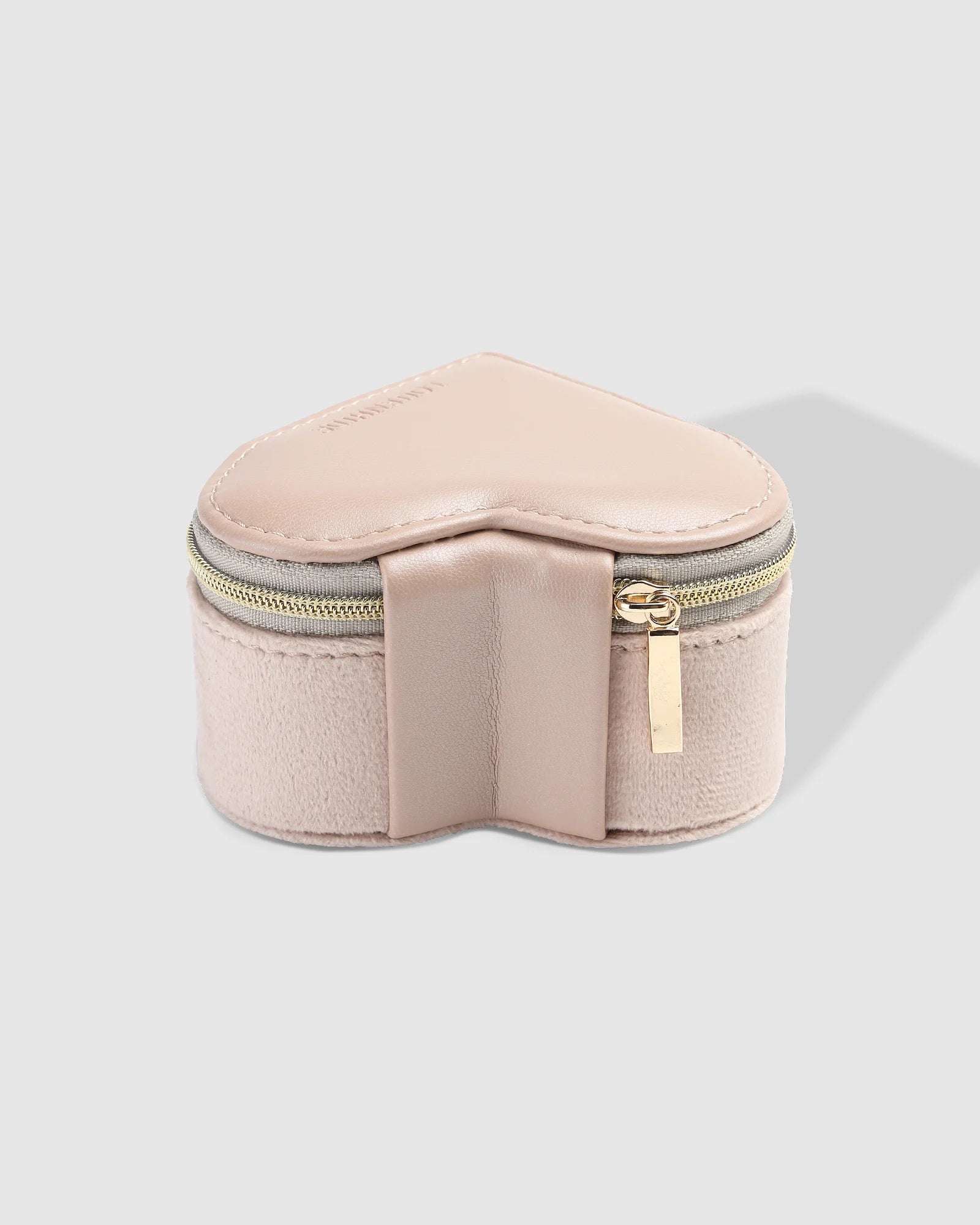 The Louenhide Valerie Jewelry Box is the perfect travelling accessory to store your beloved jewelry collection. Keep your essentials organized and at the ready, in this cute jewelry case. Thoughtfully designed with an elasticated pocket for small rings or earrings and compartment space for your larger items. A thoughtful gift for bridesmaids, birthdays or someone special in your life.