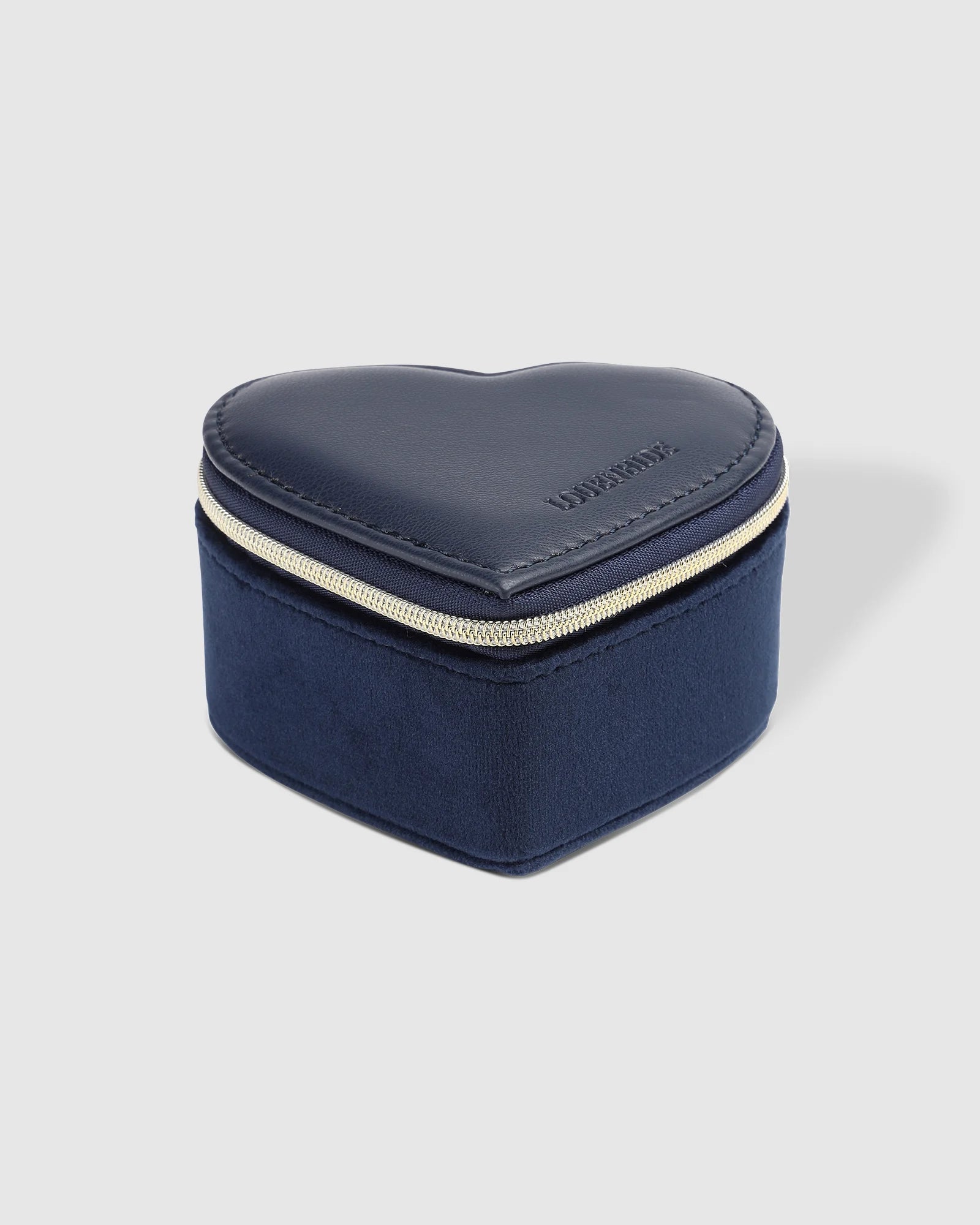 The Louenhide Valerie Jewelry Box is the perfect travelling accessory to store your beloved jewelry collection. Keep your essentials organized and at the ready, in this cute jewelry case. Thoughtfully designed with an elasticated pocket for small rings or earrings and compartment space for your larger items. A thoughtful gift for bridesmaids, birthdays or someone special in your life.