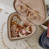 The Louenhide Valerie Jewelry Box is the perfect travelling accessory to store your beloved jewelry collection. Keep your essentials organized and at the ready, in this cute jewelry case. Thoughtfully designed with an elasticated pocket for small rings or earrings and compartment space for your larger items. A thoughtful gift for bridesmaids, birthdays or someone special in your life.