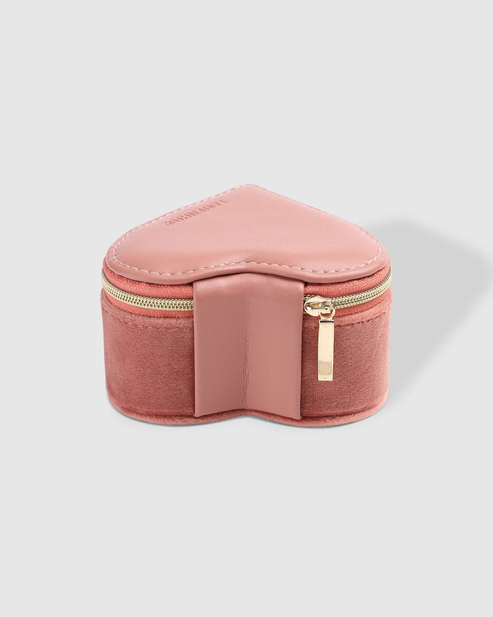 The Louenhide Valerie Jewelry Box is the perfect travelling accessory to store your beloved jewelry collection. Keep your essentials organized and at the ready, in this cute jewelry case. Thoughtfully designed with an elasticated pocket for small rings or earrings and compartment space for your larger items. A thoughtful gift for bridesmaids, birthdays or someone special in your life.