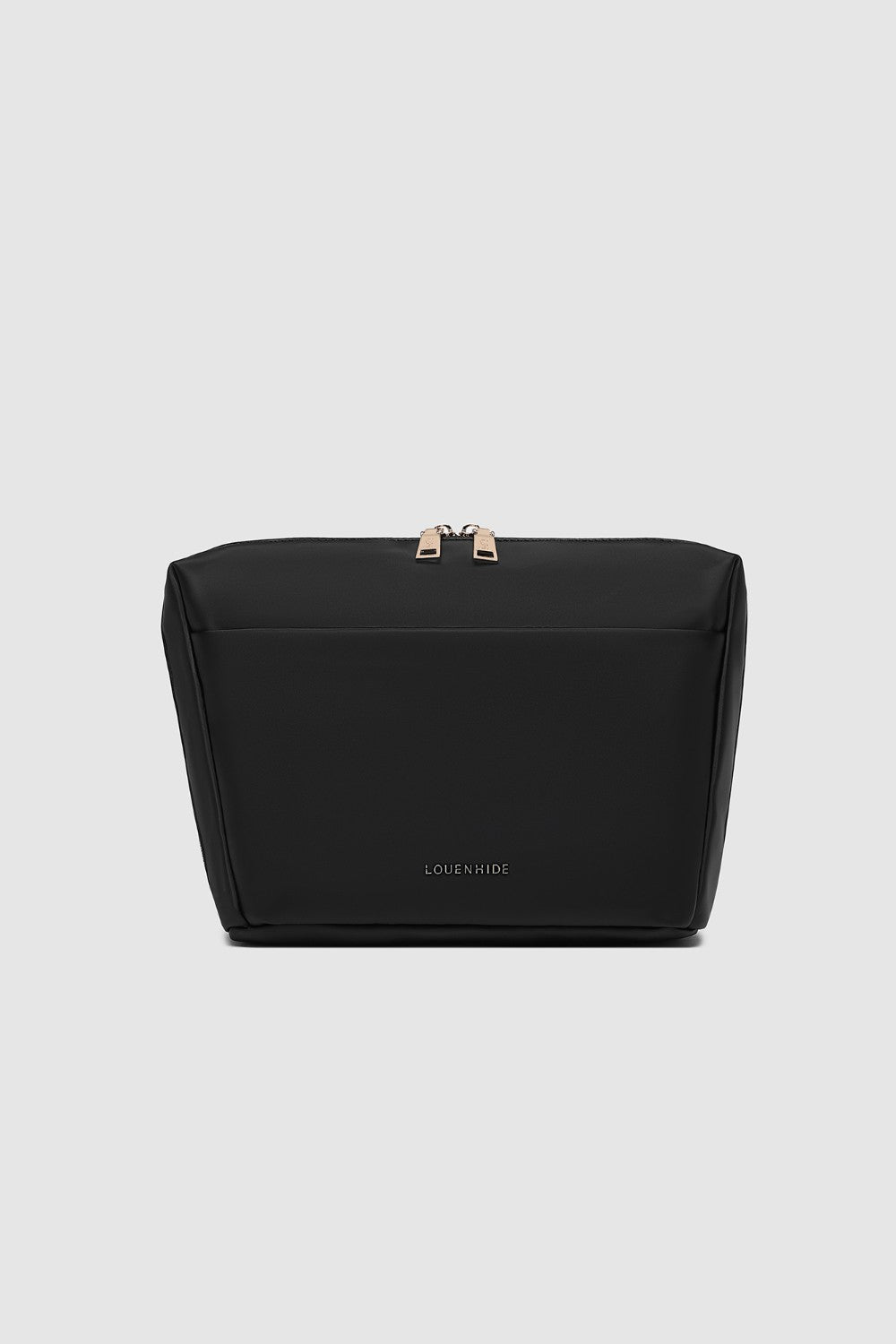 Black cosmetic bag with gold accents on a light gray background