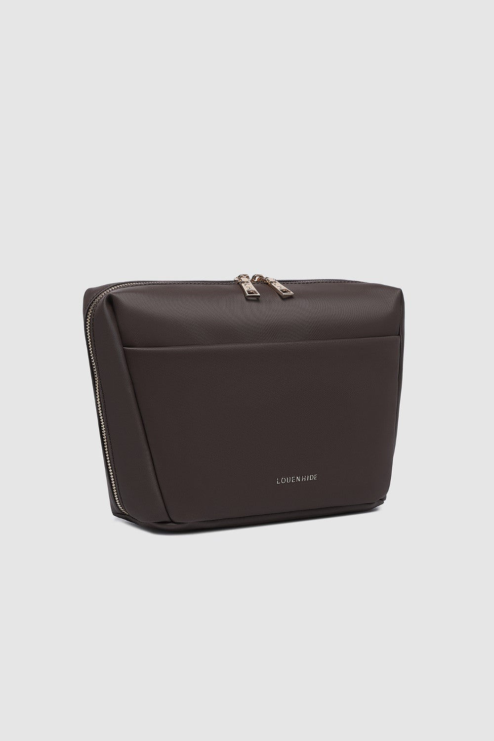 Brown toiletry bag with gold zipper on a light gray background