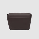 Dark brown pleather handbag on a light gray background