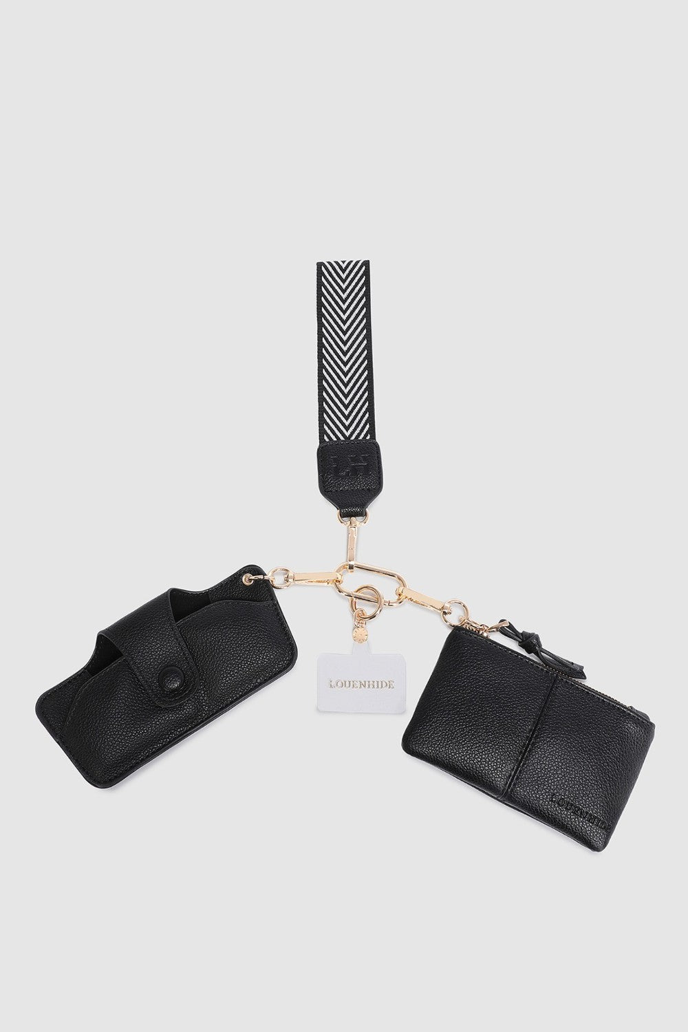 Black pleather wallet with strap and cardholder on a light gray background