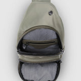 The Louenhide Boyd Nylon Sling Bag is an on-trend unisex sling bag designed with both style and functionality in mind. Organisation has never been easier with the three-section design, your valuables are within easy reach and secured safely with the stylish gunmetal zippers. Whether you're chasing an urban aesthetic or embodying an off-duty street style, this unisex nylon sling bag adapts to any casual outfit, enhancing your personal style while still offering ultimate practicality. The Boyd Khaki features 