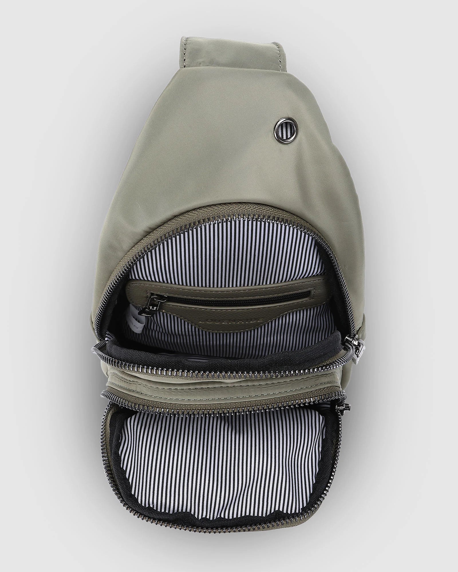 The Louenhide Boyd Nylon Sling Bag is an on-trend unisex sling bag designed with both style and functionality in mind. Organisation has never been easier with the three-section design, your valuables are within easy reach and secured safely with the stylish gunmetal zippers. Whether you're chasing an urban aesthetic or embodying an off-duty street style, this unisex nylon sling bag adapts to any casual outfit, enhancing your personal style while still offering ultimate practicality. The Boyd Khaki features 