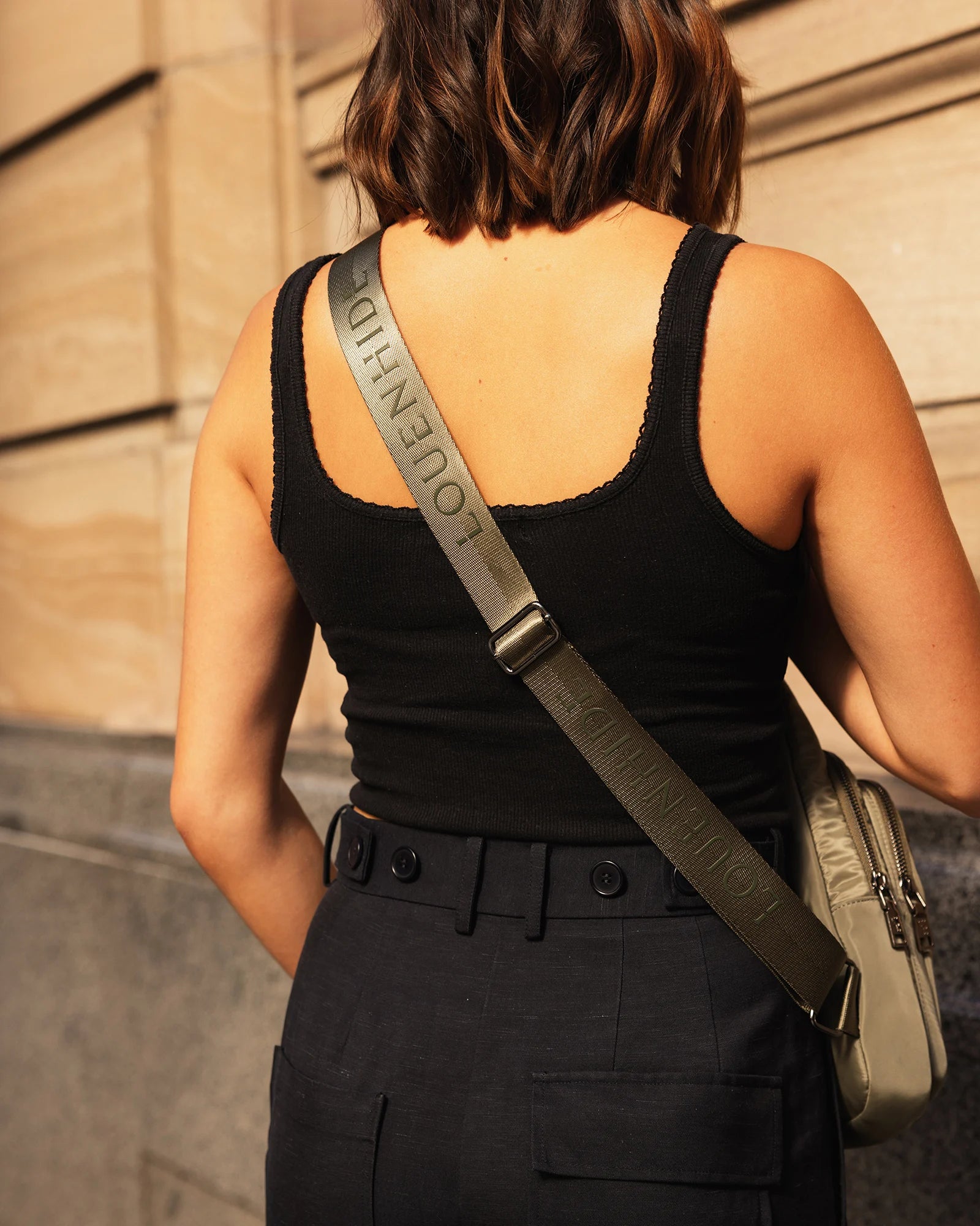 The Louenhide Boyd Nylon Sling Bag is an on-trend unisex sling bag designed with both style and functionality in mind. Organisation has never been easier with the three-section design, your valuables are within easy reach and secured safely with the stylish gunmetal zippers. Whether you're chasing an urban aesthetic or embodying an off-duty street style, this unisex nylon sling bag adapts to any casual outfit, enhancing your personal style while still offering ultimate practicality. The Boyd Khaki features 
