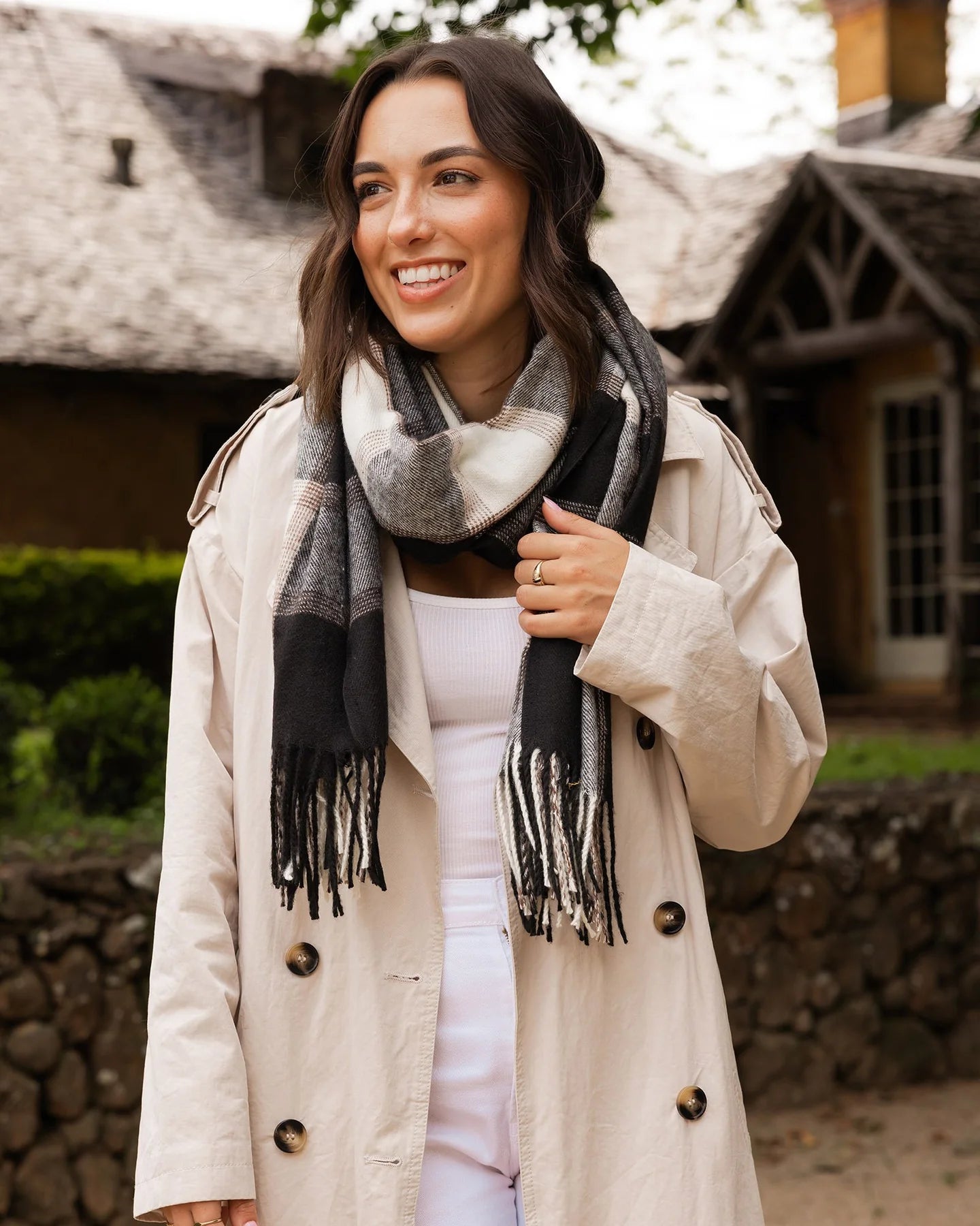 The Louenhide Edinburgh Scarf is truly a winter wardrobe staple.&nbsp; Designed with style and functionality in mind, the neutral plaid design and soft exterior will elevate your look and keep you cosy on a winter’s day.&nbsp; Simply swing it over your shoulders for a fashion accessory or wrap it around your neck for added warmth.&nbsp; Invest in a stylish women’s scarf this season.