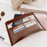 The Louenhide Ella Bag organizer is your answer to versatile organization. Transcending the boundaries of conventional organization, this multifunctional wallet can effortlessly transform to accommodate your travel or daily needs. From a sleek purse neatly holding your cards and essentials in its slip pockets, to a tidy pencil case storing your stationery in the zip pockets. Don't compromise on space with this compact silhouette and streamline your work essentials with the Ella Bag Organizer.