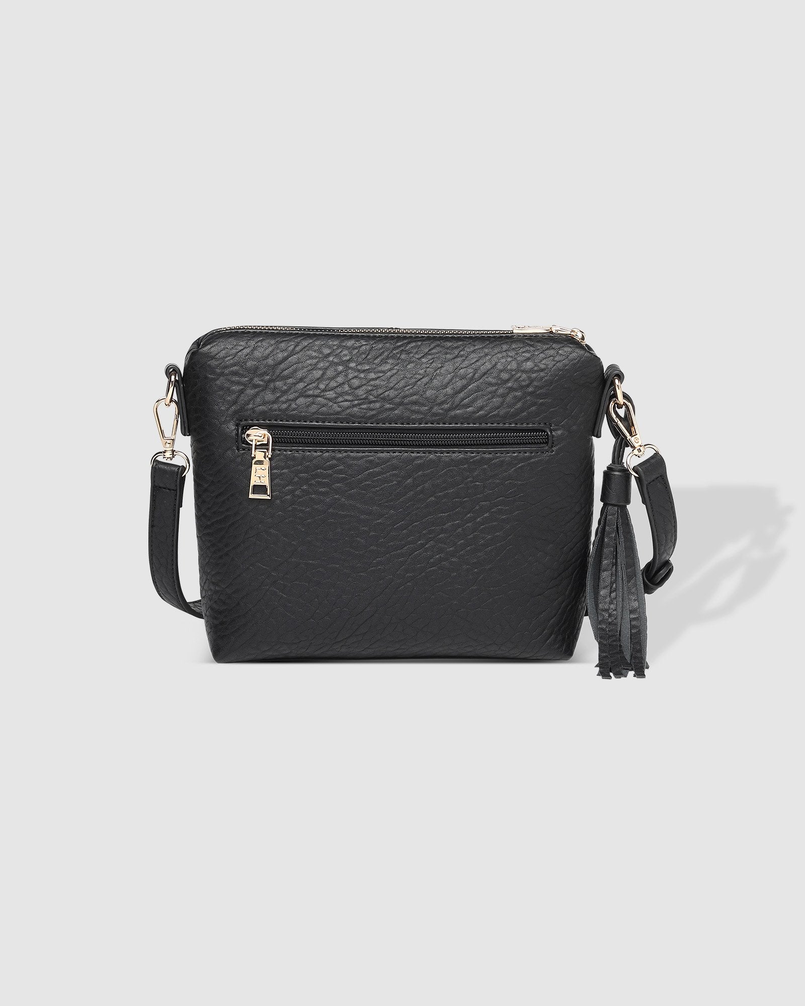 The Louenhide Kasey Textured Crossbody Bag with the Logo Strap is a classic women's everyday bag with elevated style. Designed in a soft and slouchy design, this casual crossbody bag is a smaller take on our best-selling Daisy Crossbody Bag. Secure your favourite products in either the zip pocket, the two slip pockets or in the interior compartment for your bigger items such as sunglasses, purse and phone with ease.