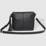 The Louenhide Kasey Textured Crossbody Bag with the Logo Strap is a classic women's everyday bag with elevated style. Designed in a soft and slouchy design, this casual crossbody bag is a smaller take on our best-selling Daisy Crossbody Bag. Secure your favourite products in either the zip pocket, the two slip pockets or in the interior compartment for your bigger items such as sunglasses, purse and phone with ease.