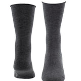 Pair of gray socks on a white background