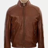Discover the unmatched style of the Regency NORWAY Cognac Leather Jacket, designed for those who value quality and sophistication. Made from premium leather in a warm cognac shade, this jacket offers exceptional durability and a polished look that complements any wardrobe. Its tailored fit enhances your silhouette while providing comfort for all-day wear. Whether out for a casual event or a night on the town, this jacket delivers timeless appeal and effortless confidence. Upgrade your outerwear collection w