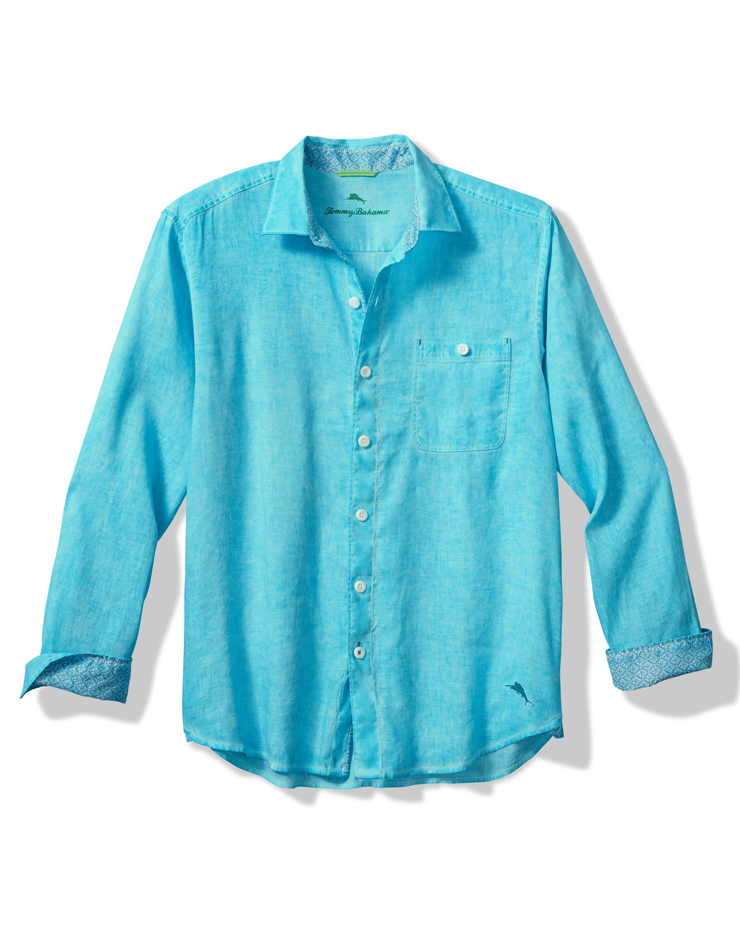 Escape to the islands with the Tommy Bahama Breeze Fade Linen Shirt! This luxurious shirt in Horizon blue will make you feel like you're on a tropical vacation. Made from high-quality linen, it will keep you cool and comfortable while adding a touch of island style to any wardrobe.