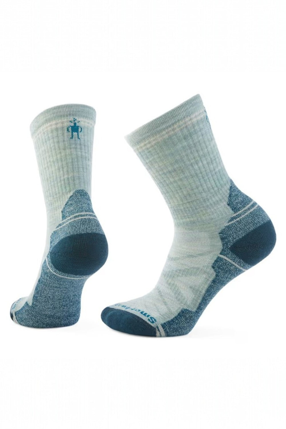 Pair of light and dark green socks on a white background