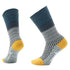 Pair of socks with green, gray, and yellow pattern on a white background