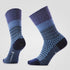 Pair of purple patterned socks on a light blue background