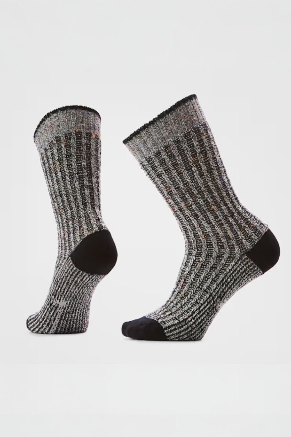 Pair of gray and black socks on a white background