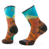 Colourful socks with geometric pattern on a white background