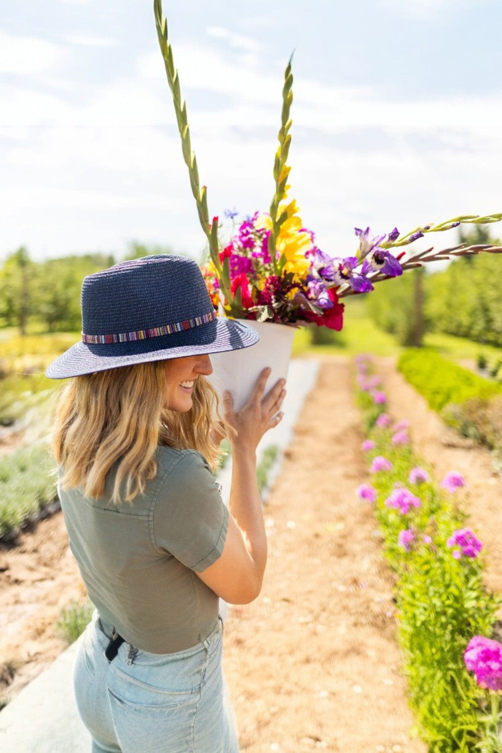 The Sedona sun hat stands out with its vibrant, multicolor embroidered band, adding a touch of artistic flair to your look. Its structured brim offers ample shade and sun protection, perfect for carefree days outdoors. With a packable design, it easily folds for adventures near and far.