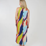 Striking sleeveless maxi dress in a bold & vibrant wave print, by Shannon Passero.  This dress features a button closure up the entire back and pockets!