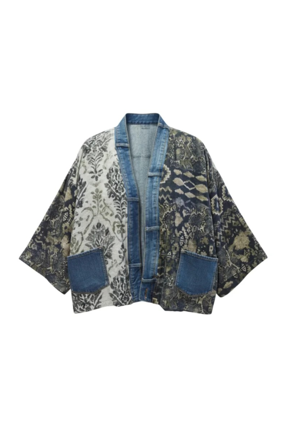 A mixed-media open-front cardigan featuring a blue denim collar, buttons, and front pockets, combined with a white damask patterned panel and a dark blue-gray ikat patterned panel.